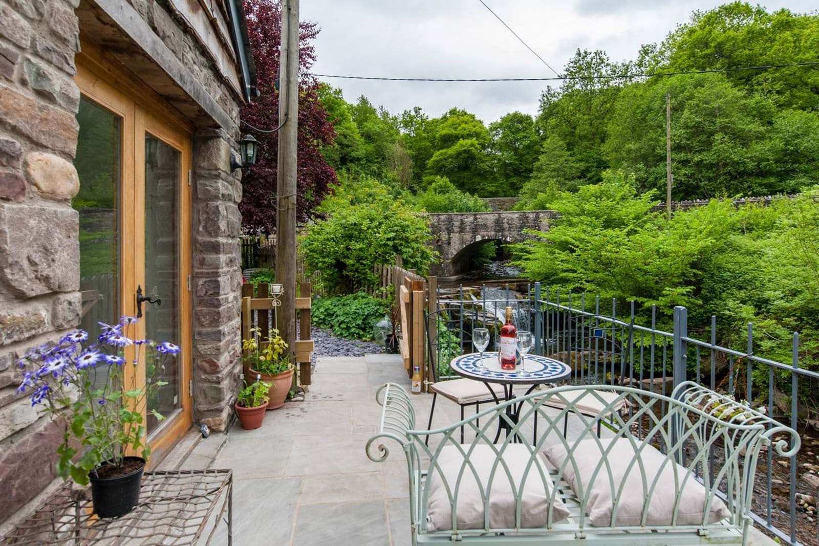 Alfresco dining on the riverside balcony